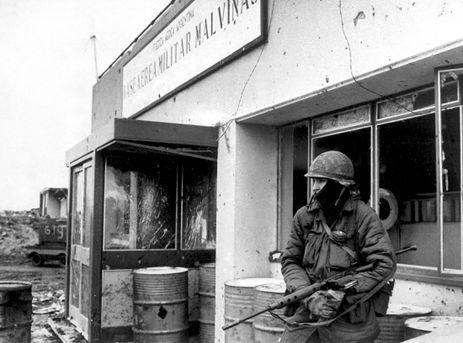 An Argentinian army soldier stands guard at an air base in Puerto Argentino during the Falkland War (Guerra de Las Malvinas) between Argentina and Britain, May 1982. Some 1,000 people died during the war that began with Argentina's invasion of the disputed islands on April 2, 1982, and ended with their expulsion by British forces on June 14, 1982.  REUTERS/Eduardo Farre  (FALKLANDS ISLANDS)